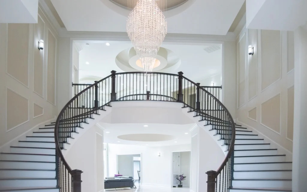 Enclave Staircase Chandelier Interior photo - W Rondon construction LLC